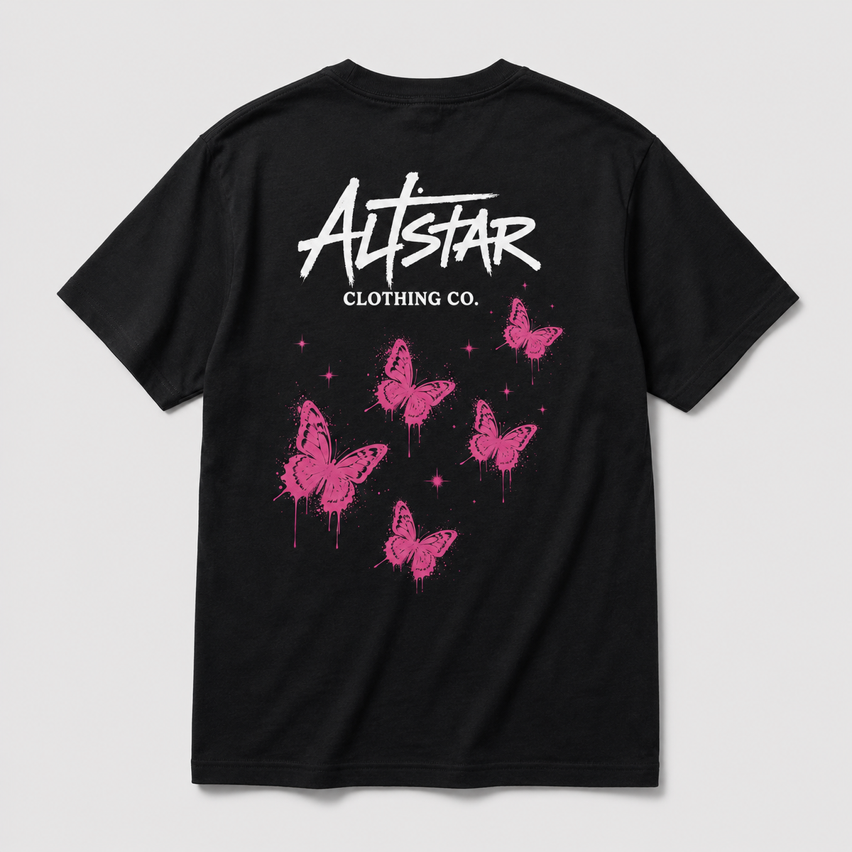 Black butterfly T-shirt with pink butterfly graphic and star accents